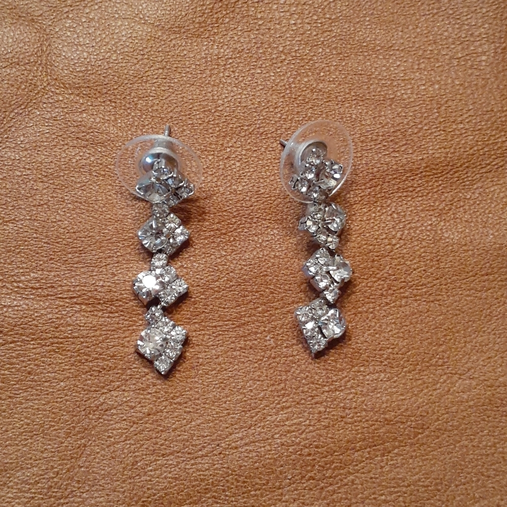 Rhinestone earrings.
